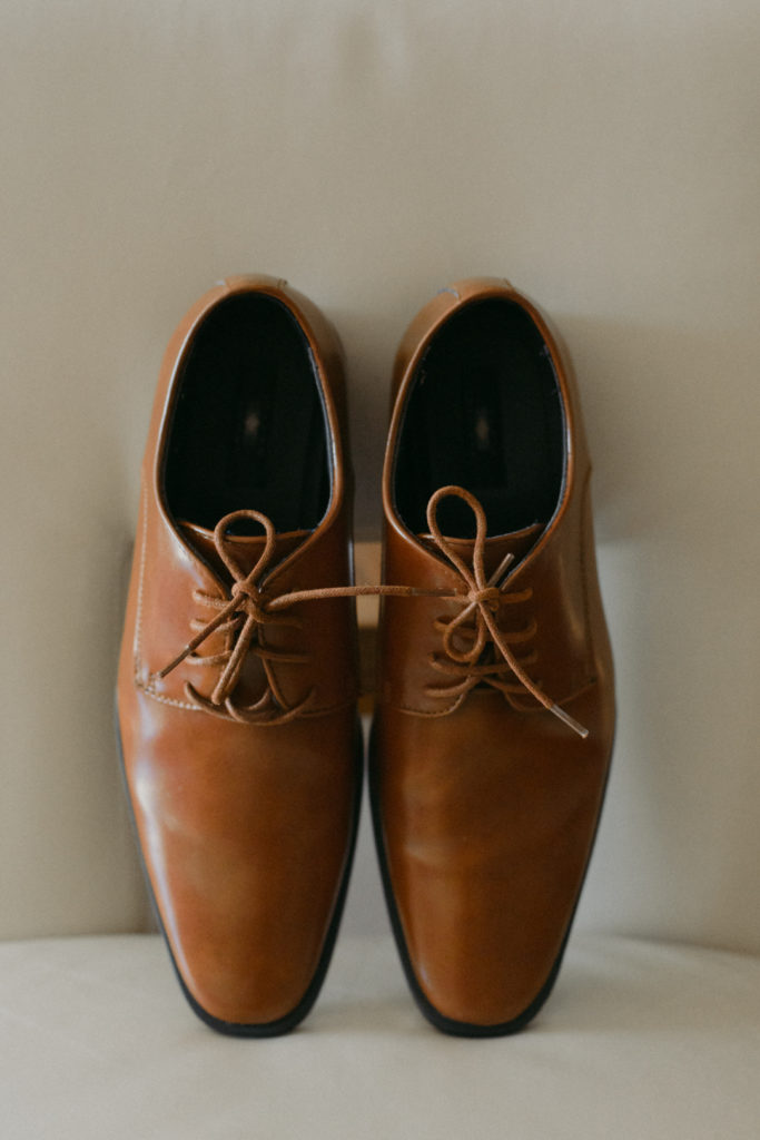 groom's tan leather shoes