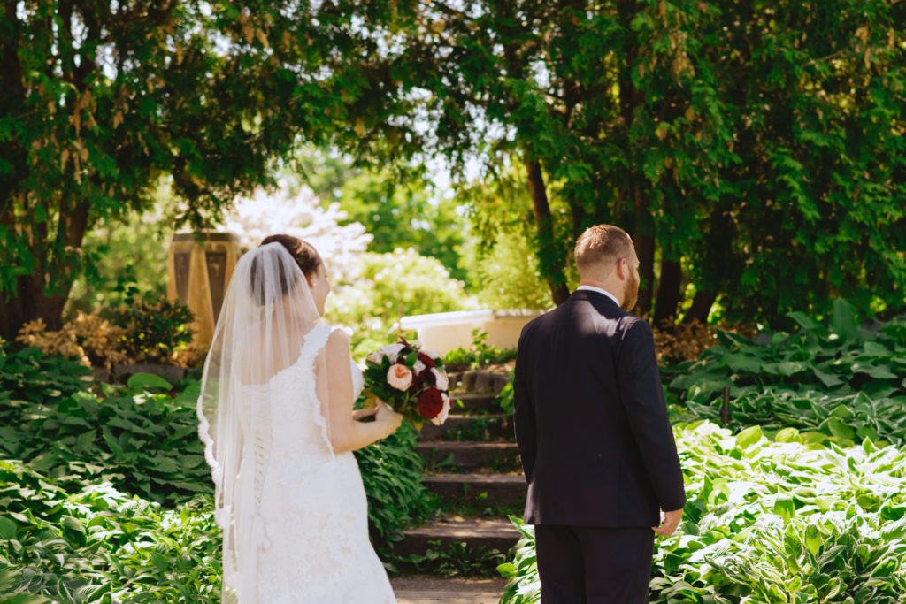 bride and groom first look in the Ornamental Gardens