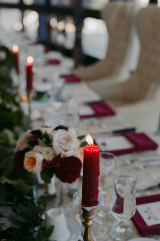 red and white decor on head table