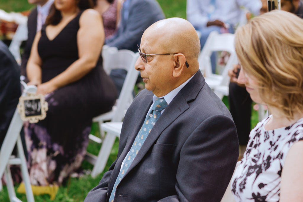 father of the groom tearing up just wedding ceremony