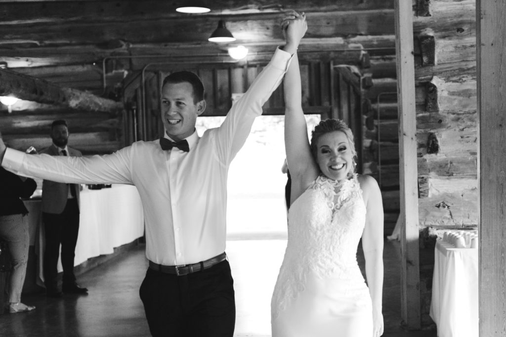 grand entrance with bride and groom at saunders farm