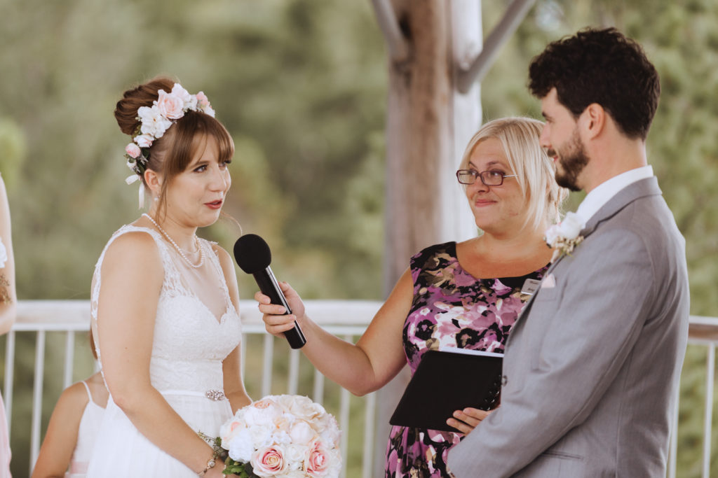 bride reciting her vows to the groom
