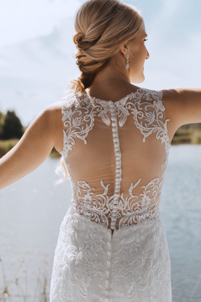 back of bride's Stella York lace dress with full back