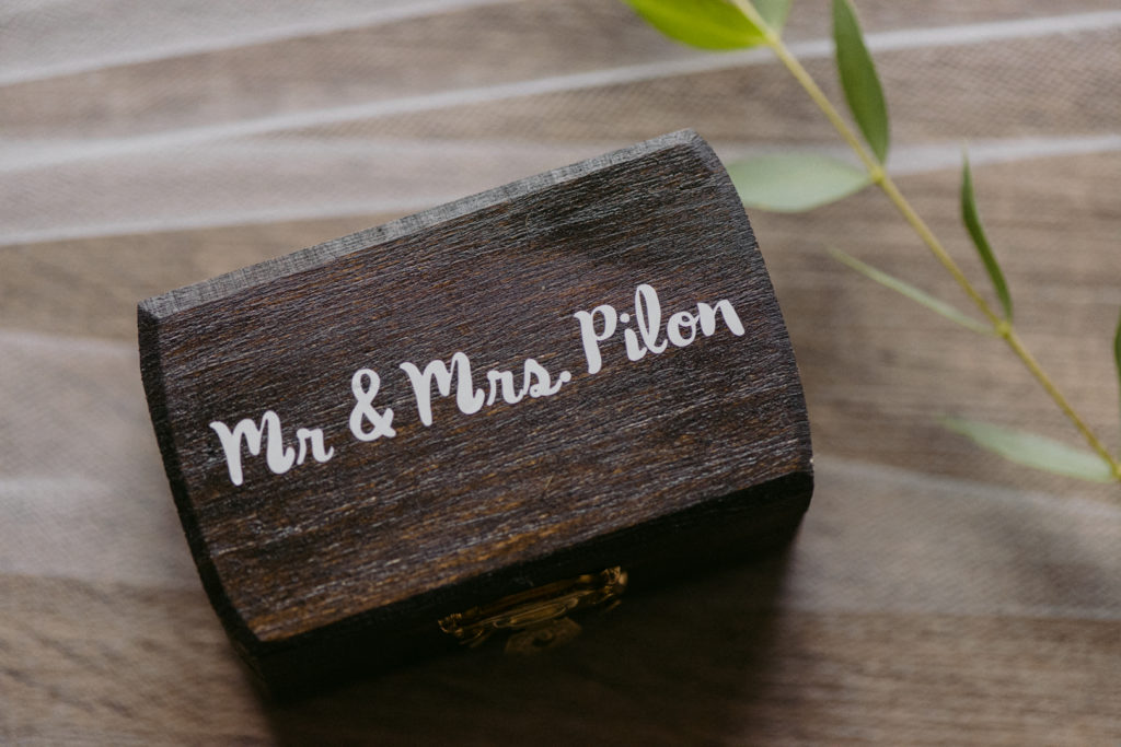 ring box with mr and mrs written on it