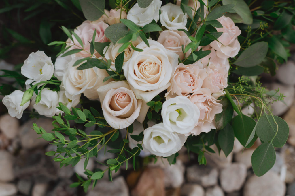 bride's wedding bouquet in blush and green