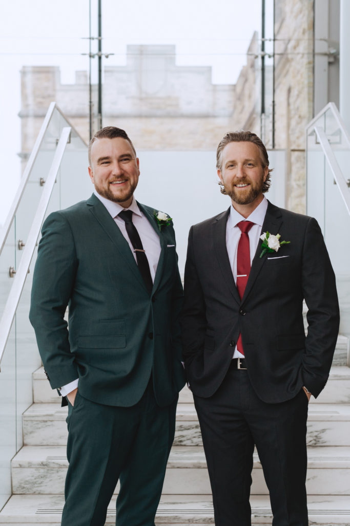 groom and groomsman in the Museum of Nature in Ottawa