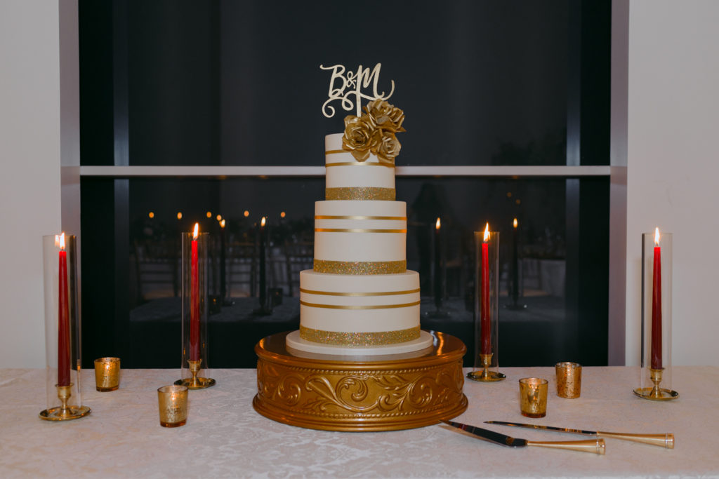 three tier white and gold wedding cake