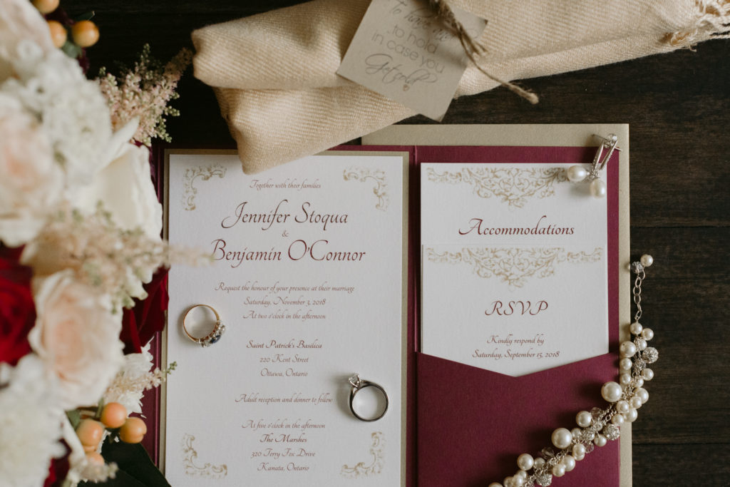 invitation suite and rings flat lay
