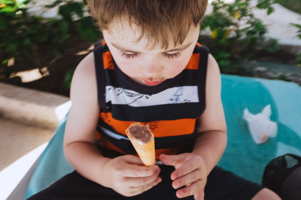 toddler eating an ice cream cone