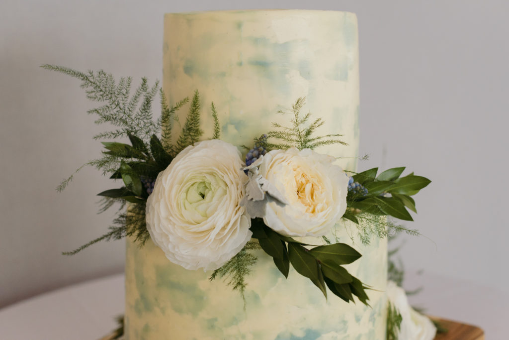 yellow and blue wedding cake