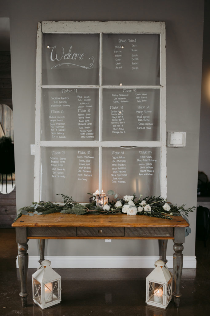 seating chart on old wooden window