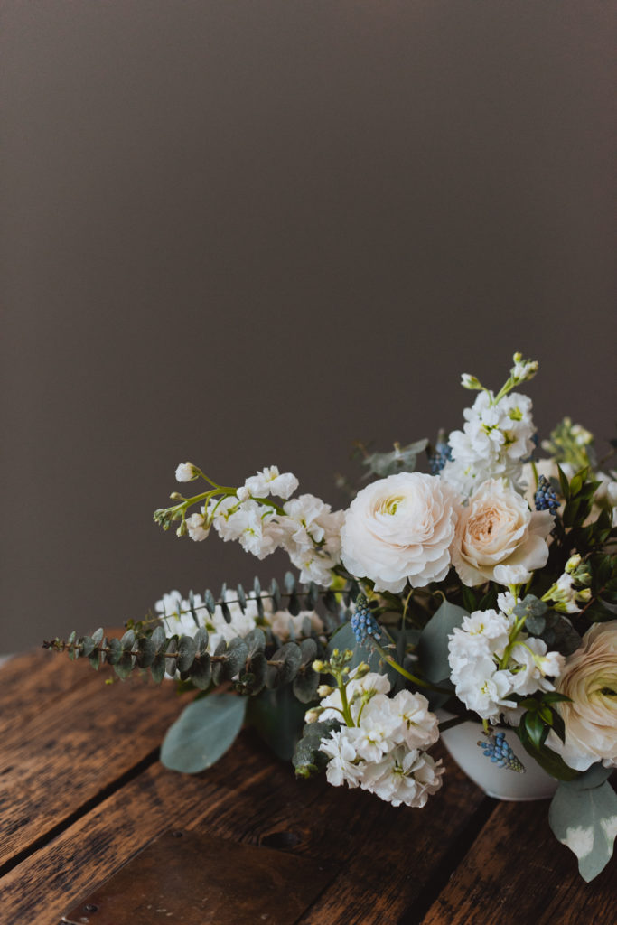 floral arrangement on wooden table