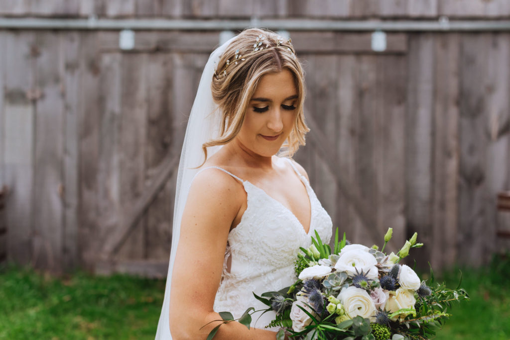 bride holding wild bouquet