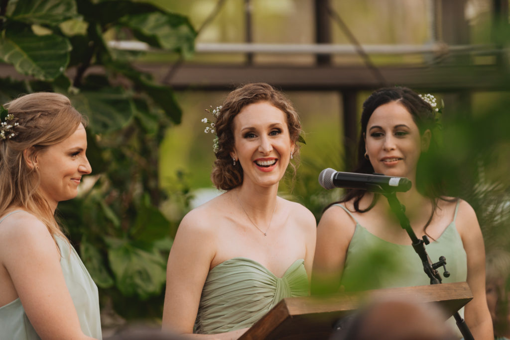 bridesmaids giving speech during wedding reception