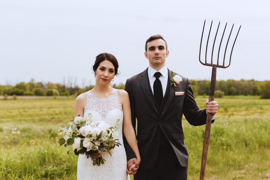 American Gothic inspired photo of bride and groom