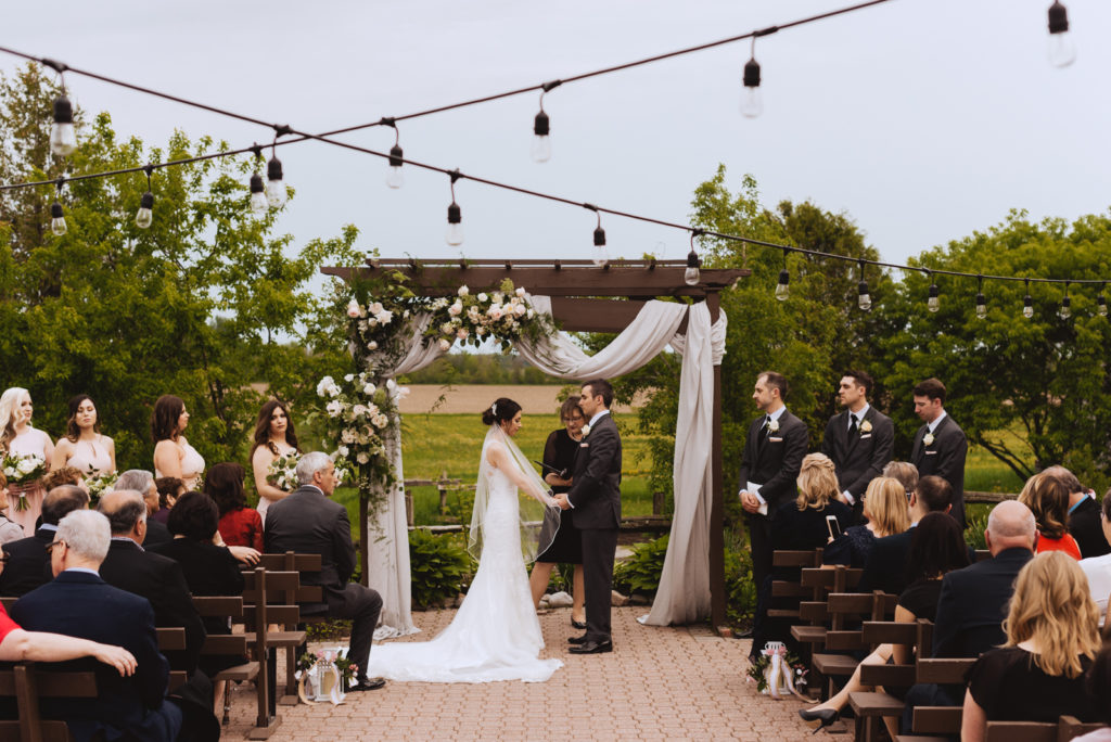 outdoor wedding ceremony at Strathmere Lodge in Ottawa