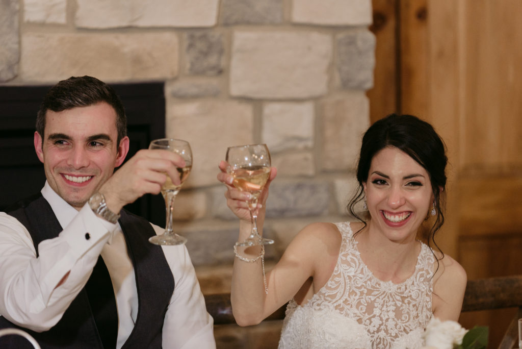 bride and groom toasting during speeches