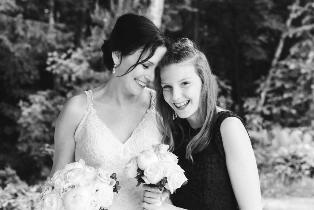 bride and her daughter laughing