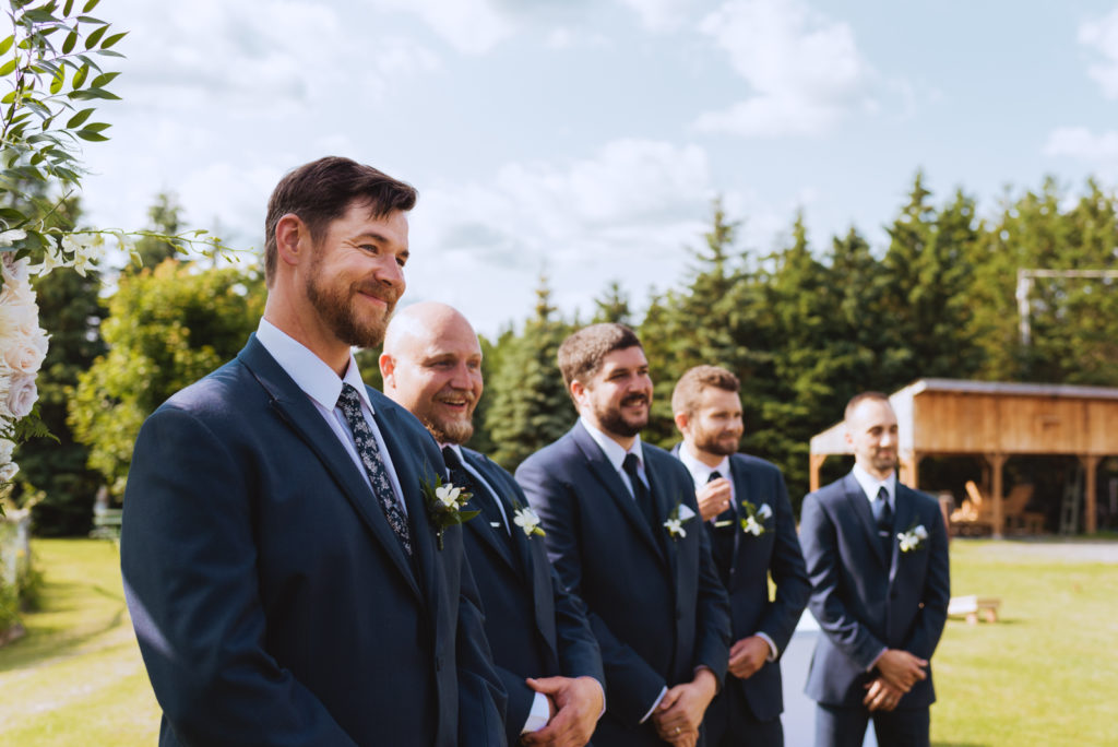 groom seeing his bride for the first time at wedding ceremony