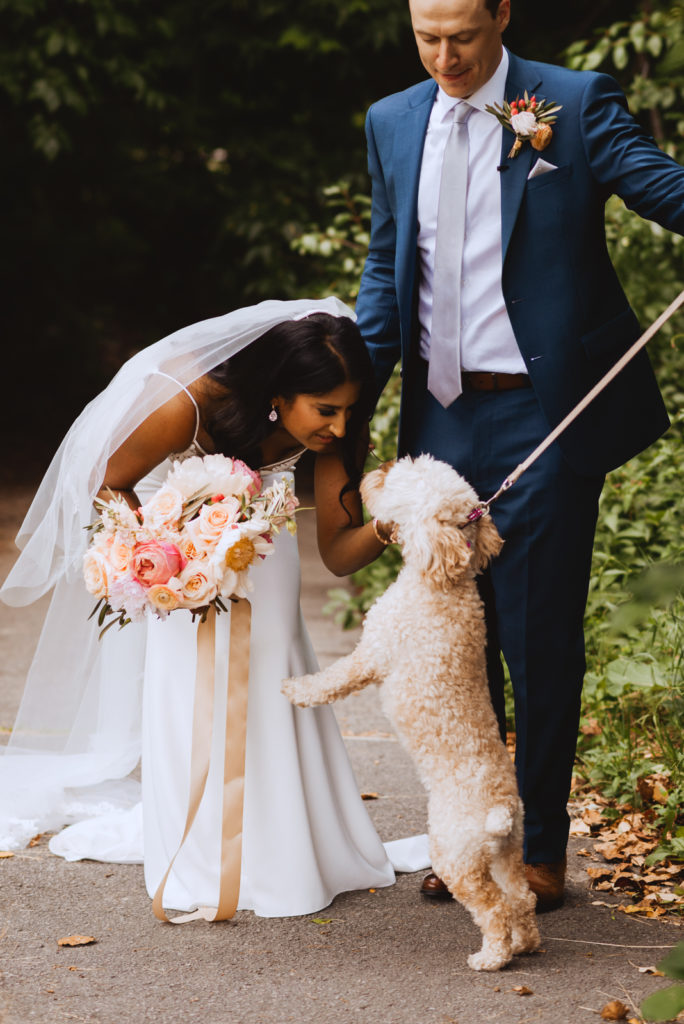 bride seeing her dog during first look
