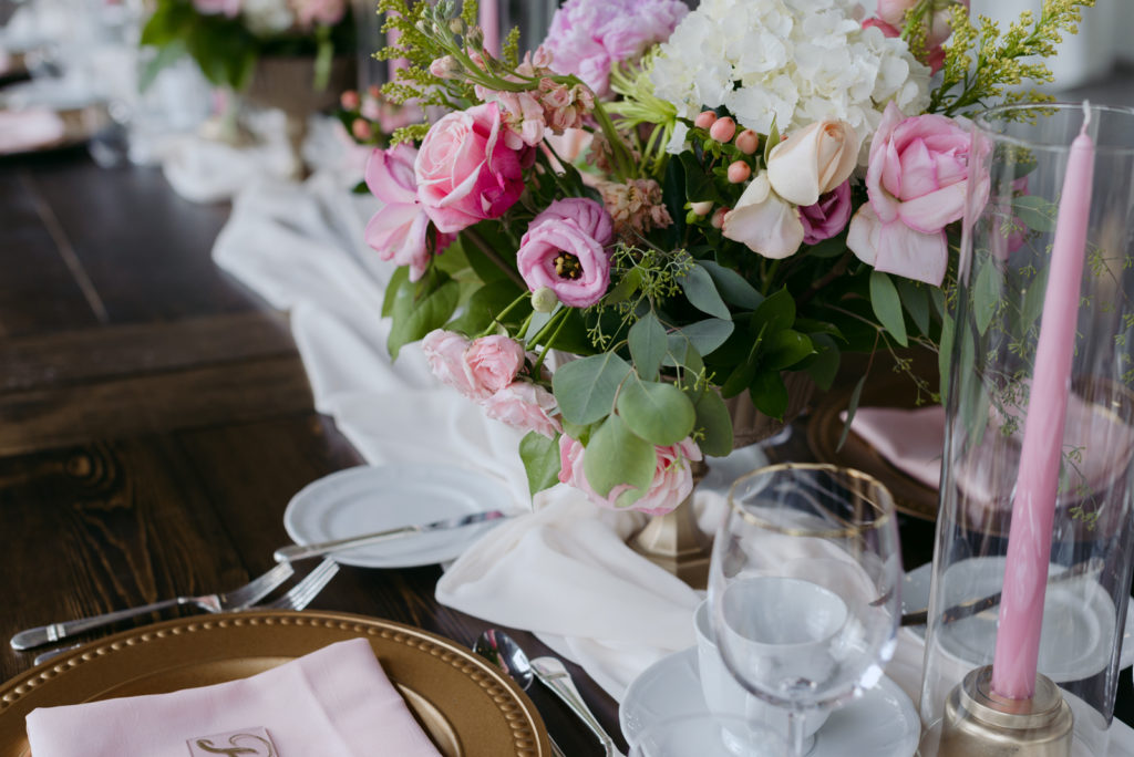 wedding reception decor with floral centrepieces