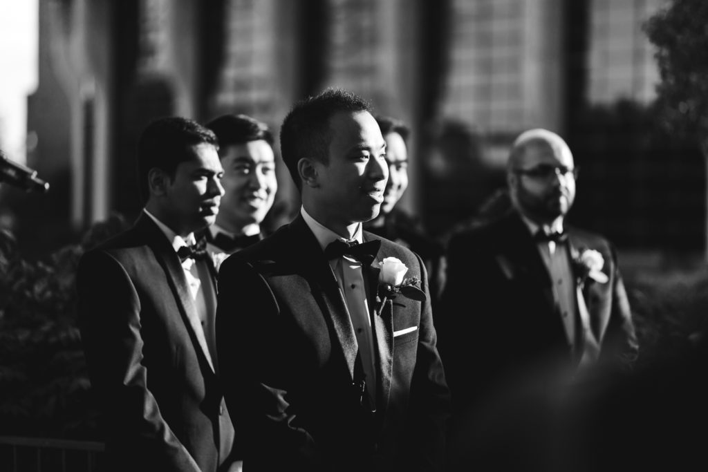 groom seeing the bride for the first time at ceremony
