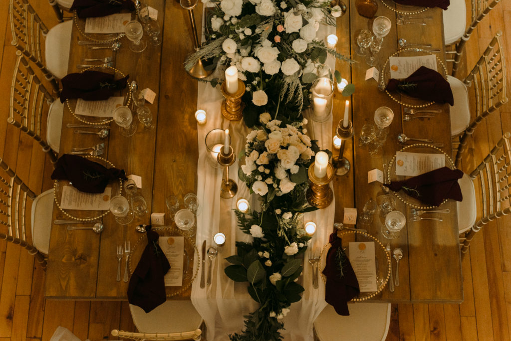 photo of headtable from overhead by candlelight