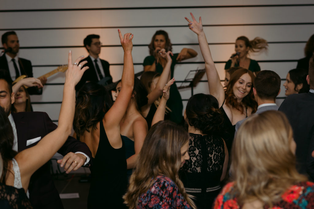 wedding guests dancing to shout at ottawa art gallery wedding