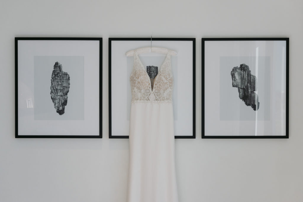 bride's dress hanging from picture frame at the andaz hotel