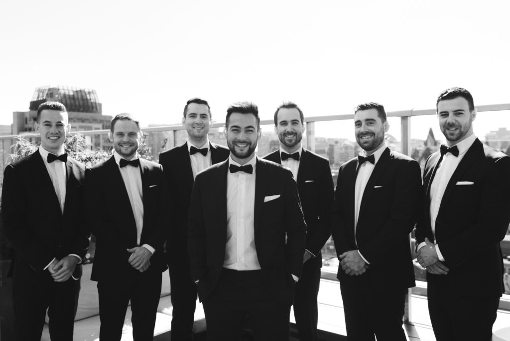 groom and groomsmen on the rooftop at the andaz hotel