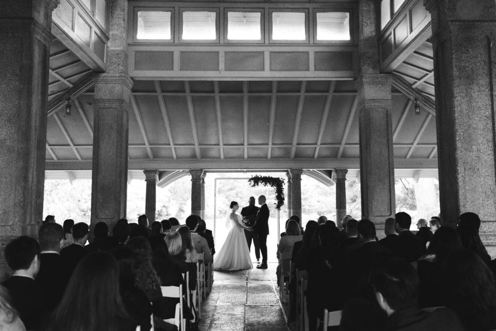 bride and groom underneath rockcliffe pavilion