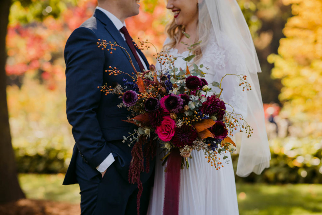 bride and groom in majors hill park during fall wedding
