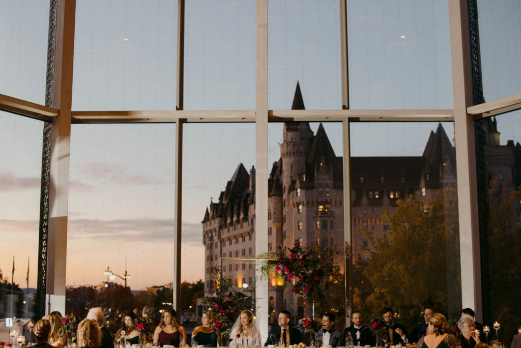 head table at the NAC in Ottawa with Chateau Laurier in the background
