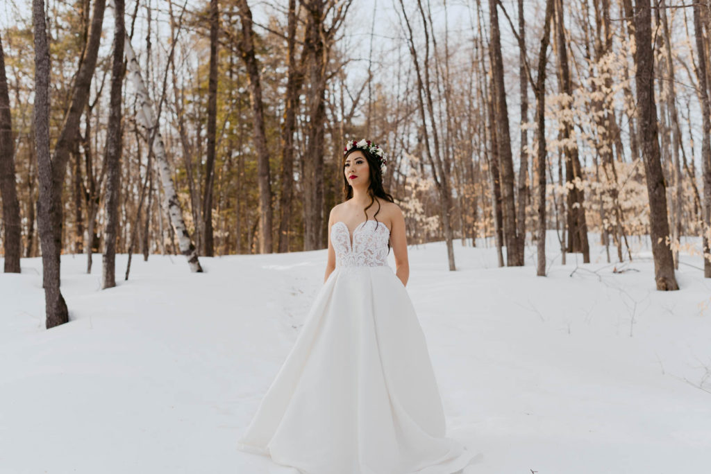 Winter bride in a forest with a floral crown
