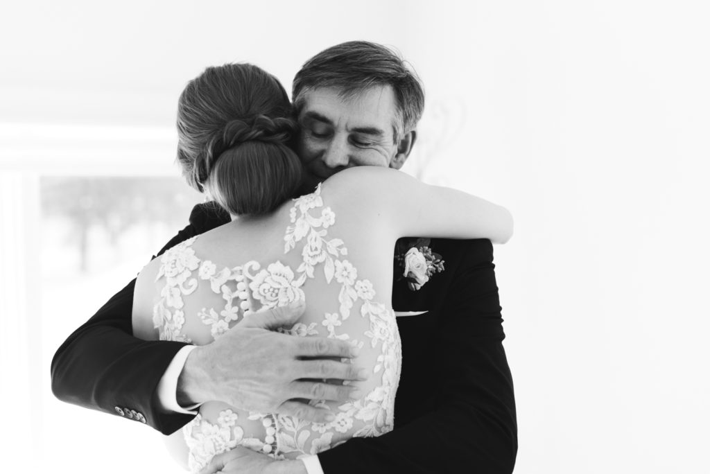 bride and her father hugging