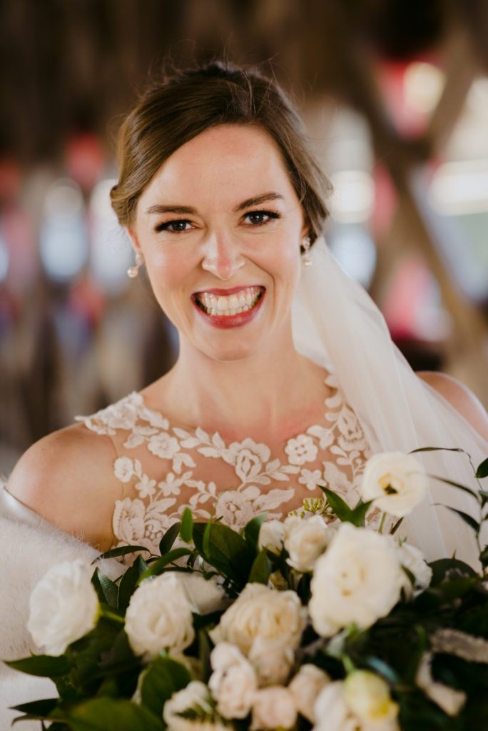 bride laughing at the camera on the wakefield covered bridge