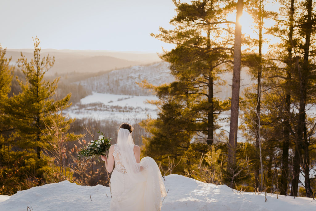 bride gazing into the sunset bride and groom during sunset at le belvedere in wakefield