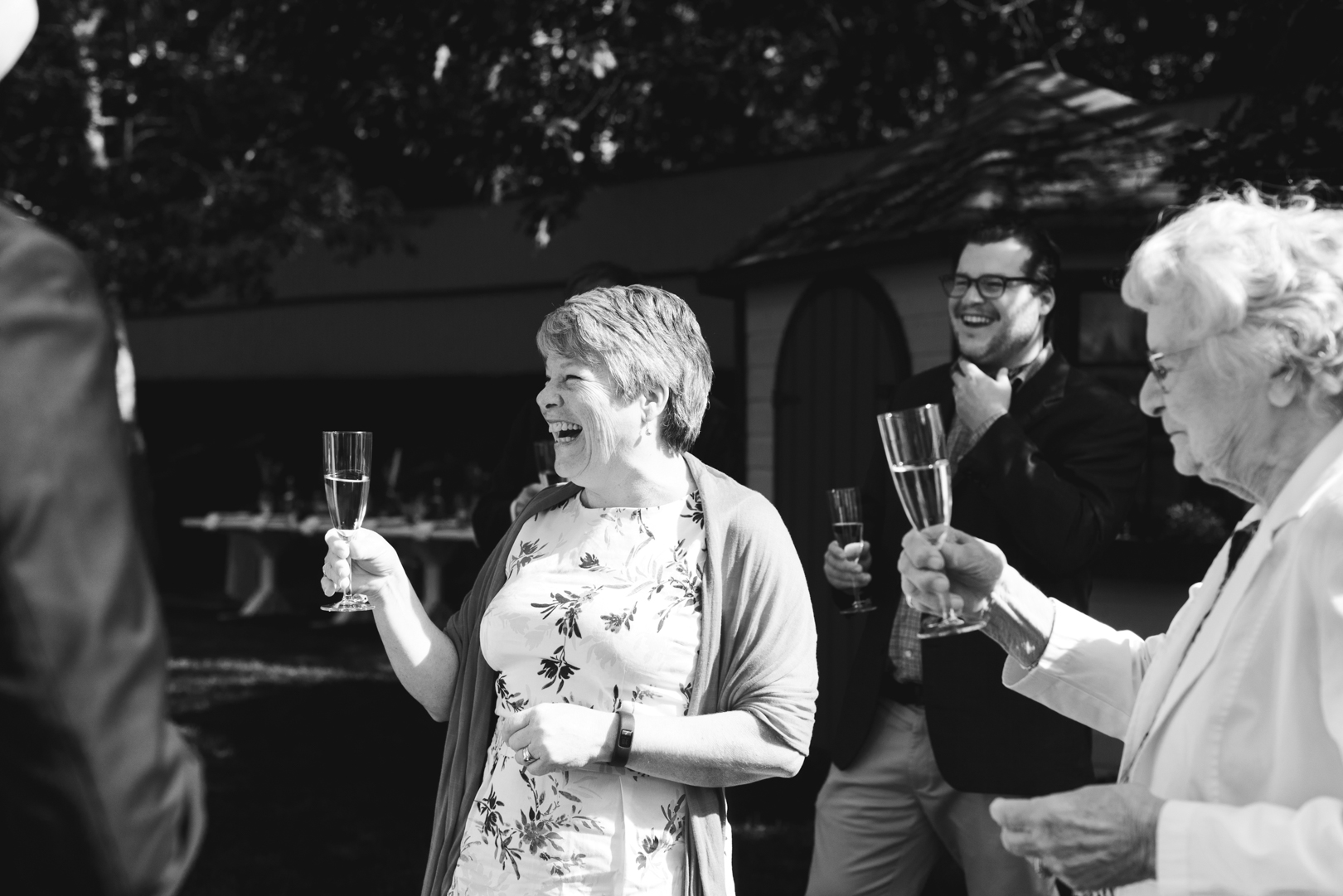 champagne toast with family in backyard