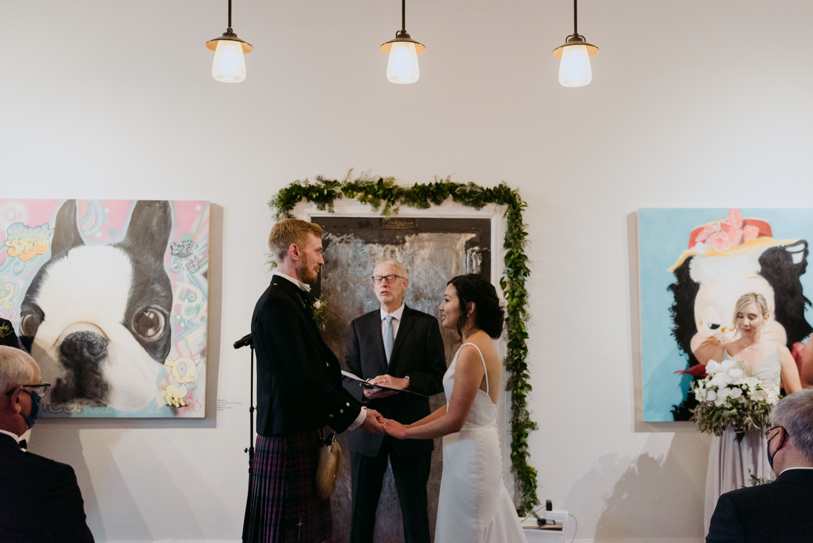 bride and groom at the altar at Orange Art Gallery wedding