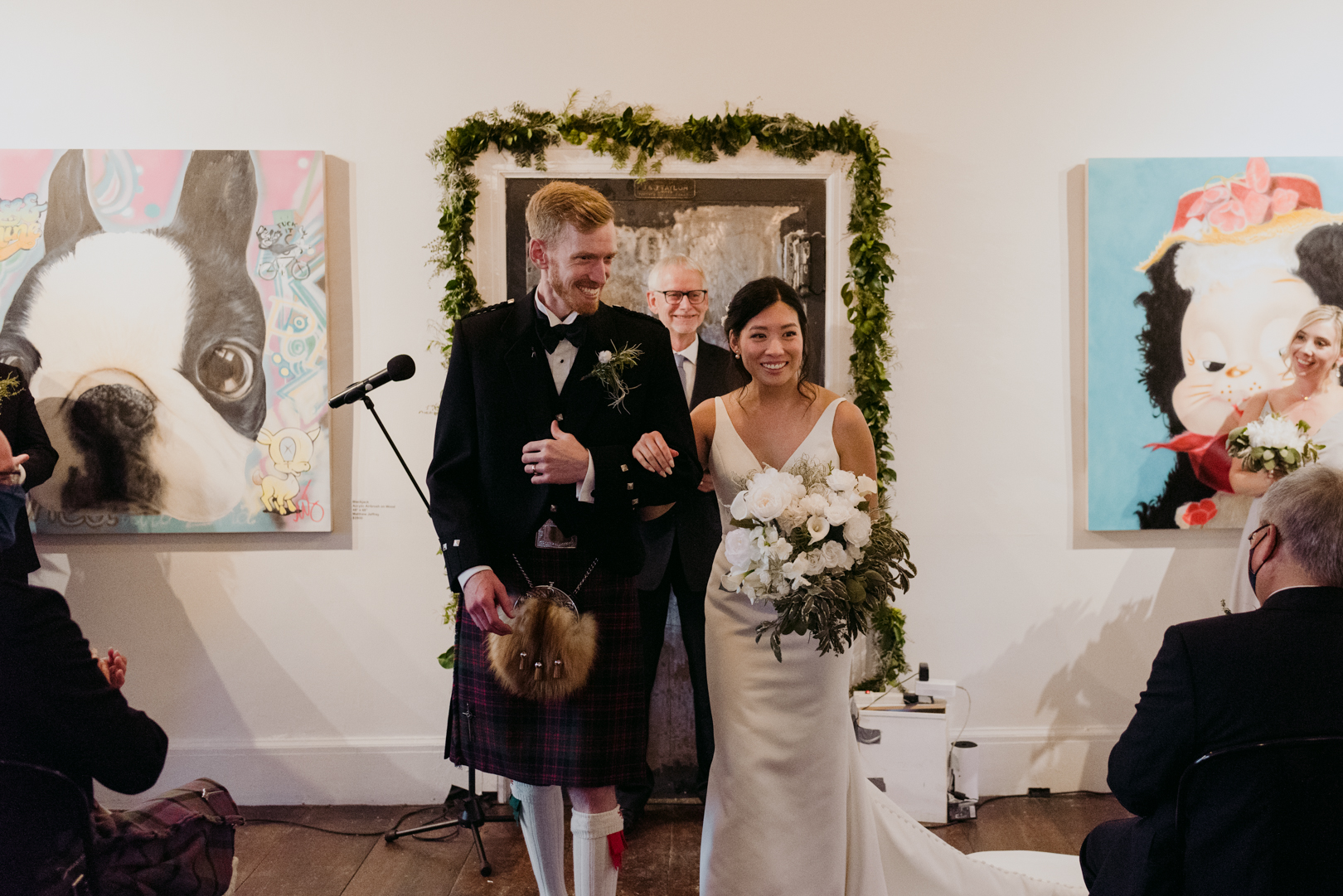 bride and groom recessional at Orange Art Gallery wedding