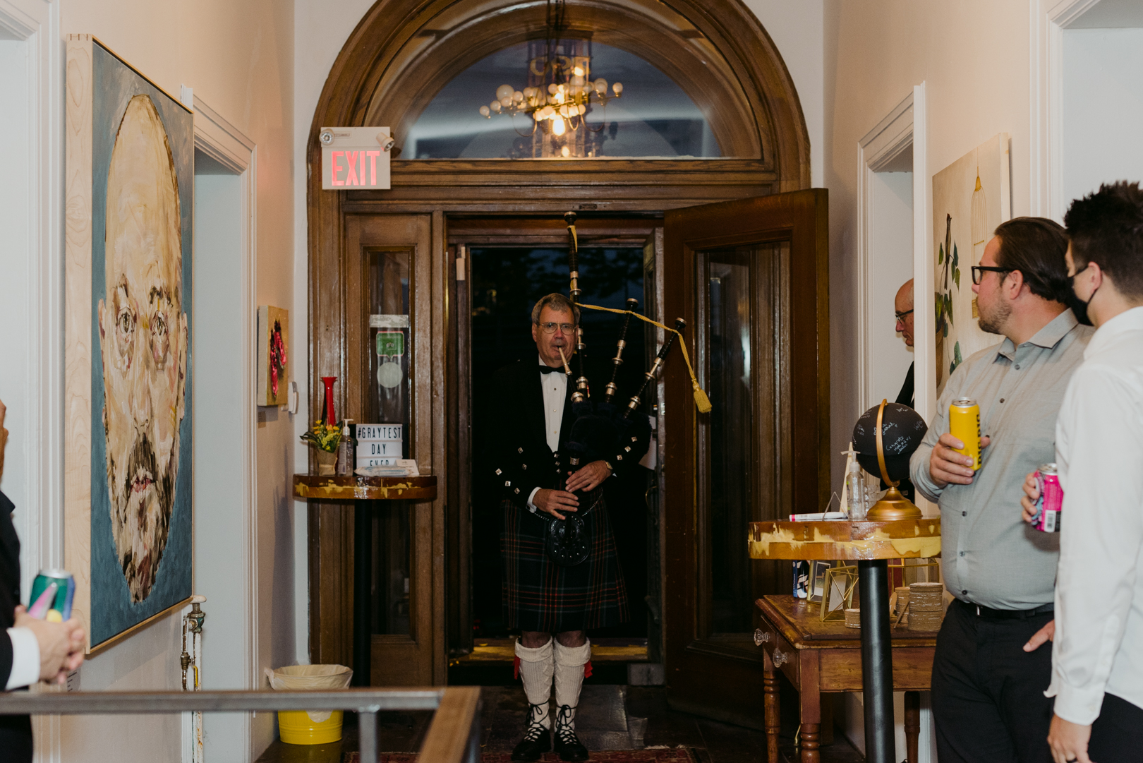 bagpiper introducing Scottish father of the groom for speech