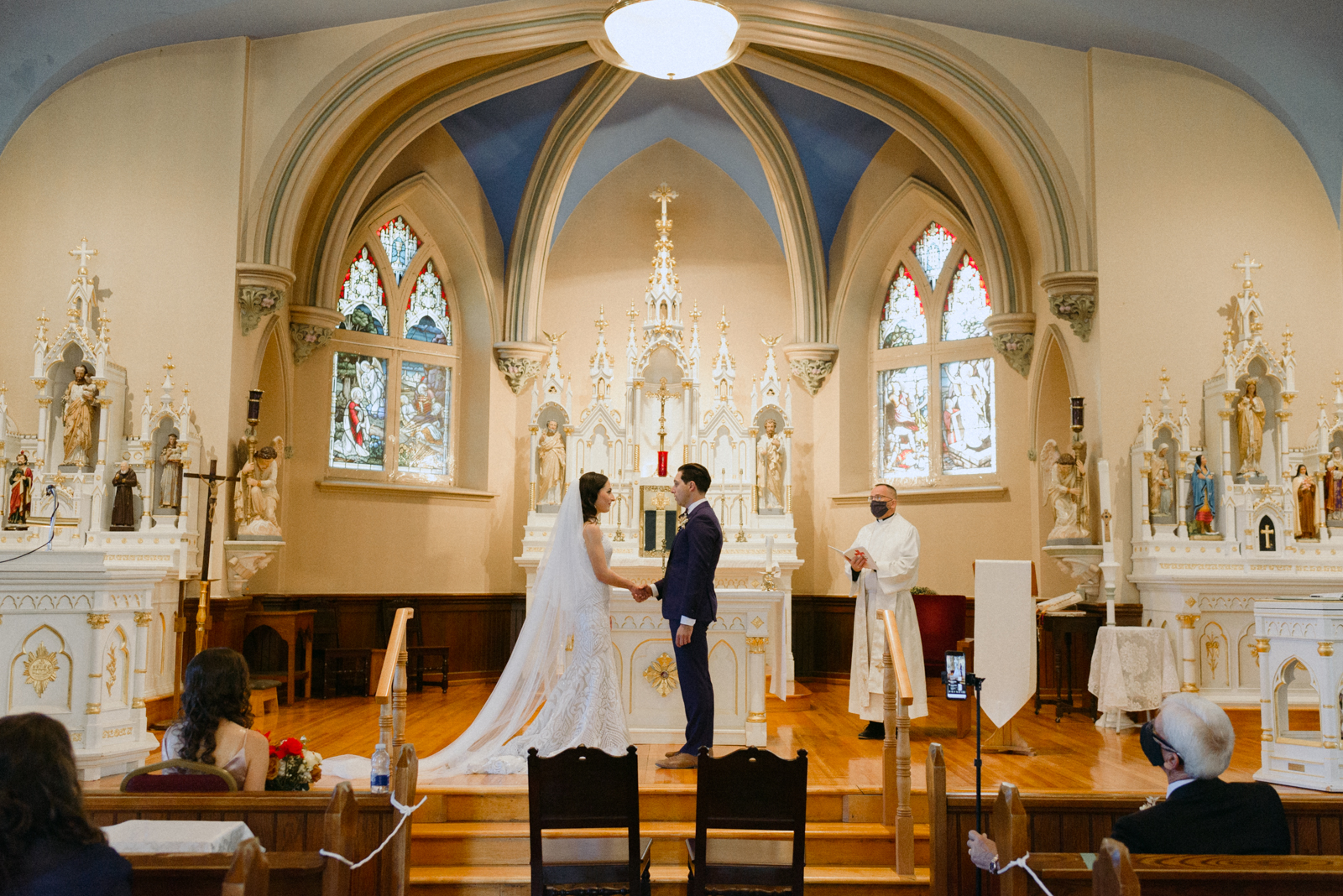bride and groom at the altar during church wedding ceremony