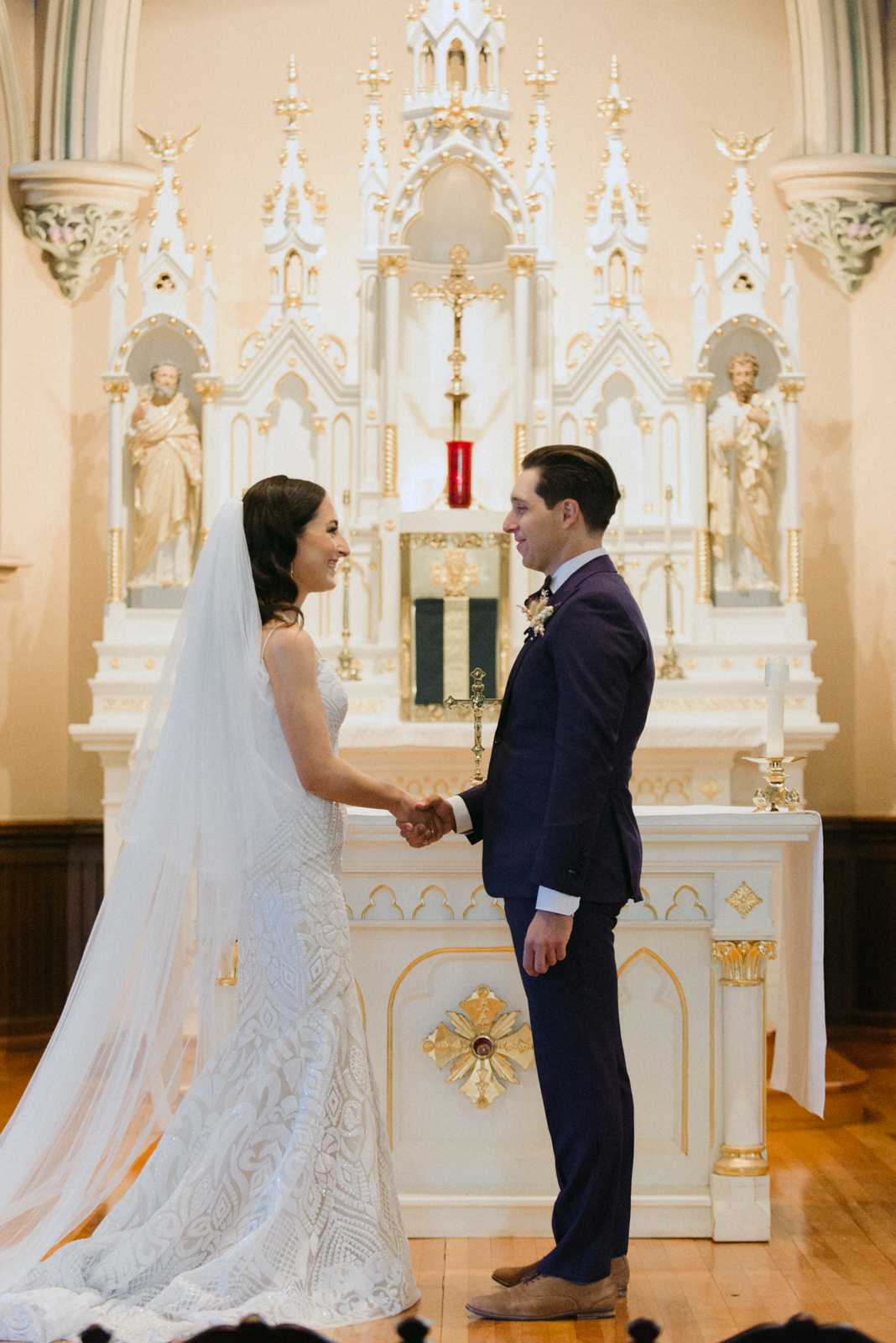 bride and groom at the altar during church wedding ceremony