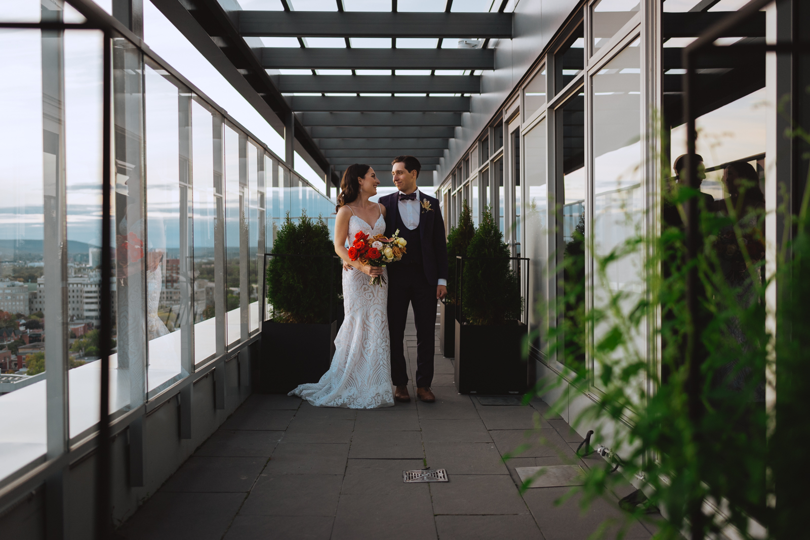 bride and groom in the presidential suite of the andaz hotel at sunset