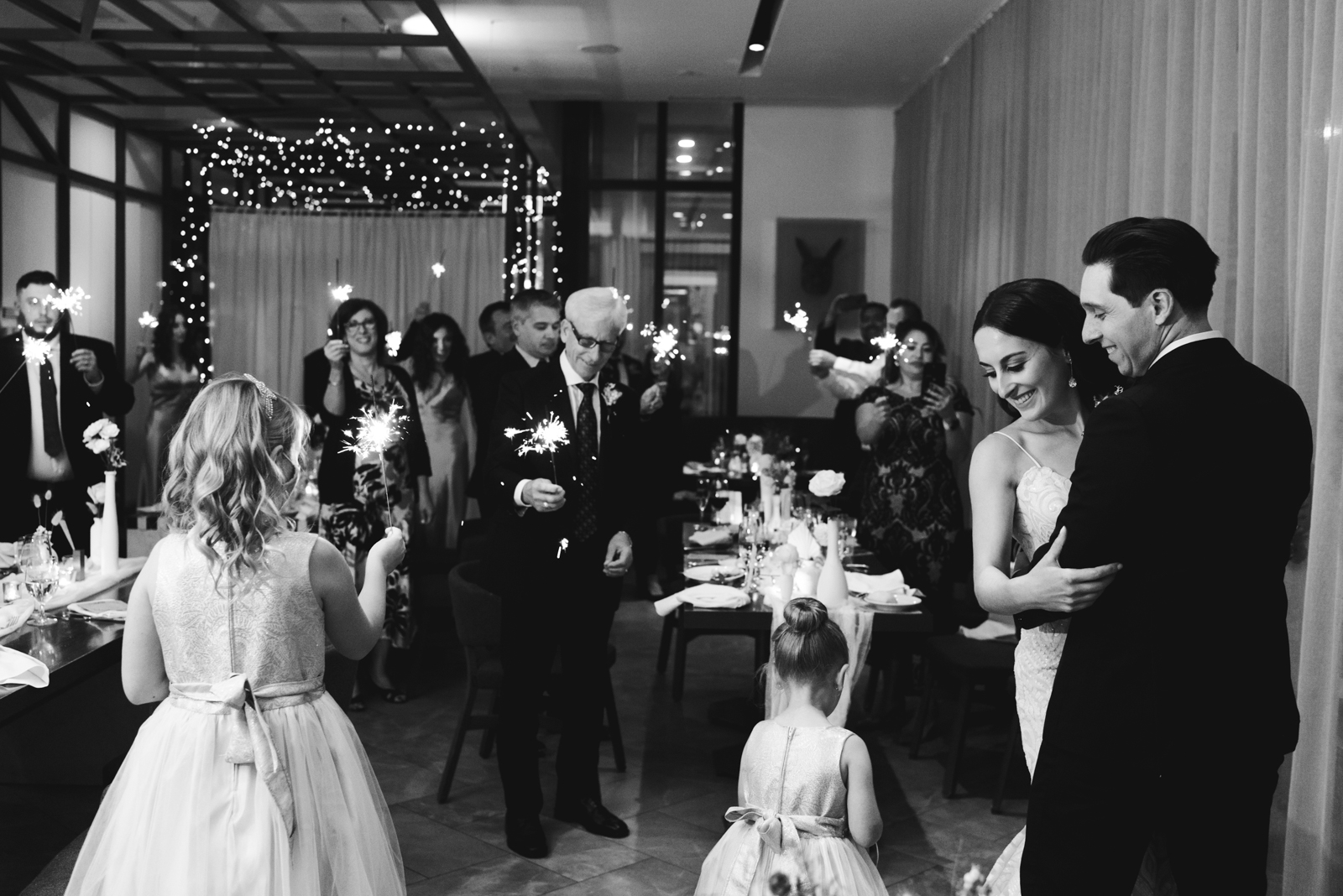 bride and groom first dance in feast and revel of the andaz hotel with sparklers