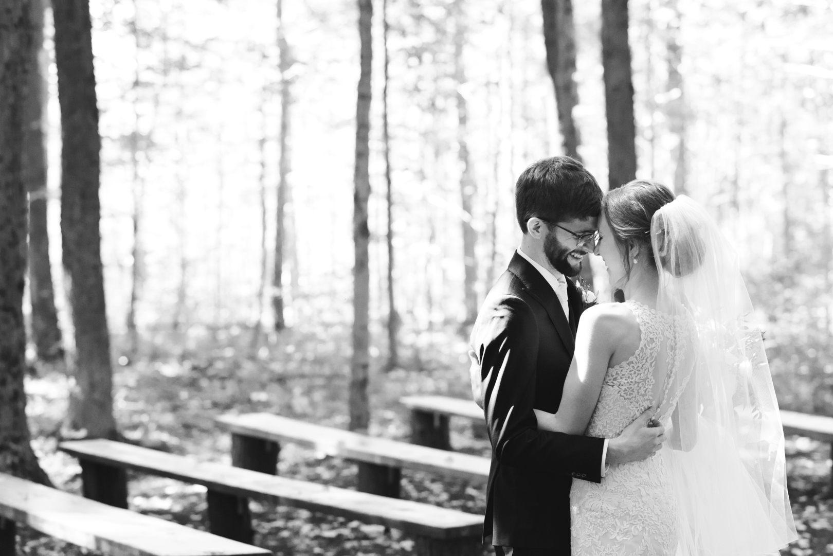 bride and groom first look in a forest