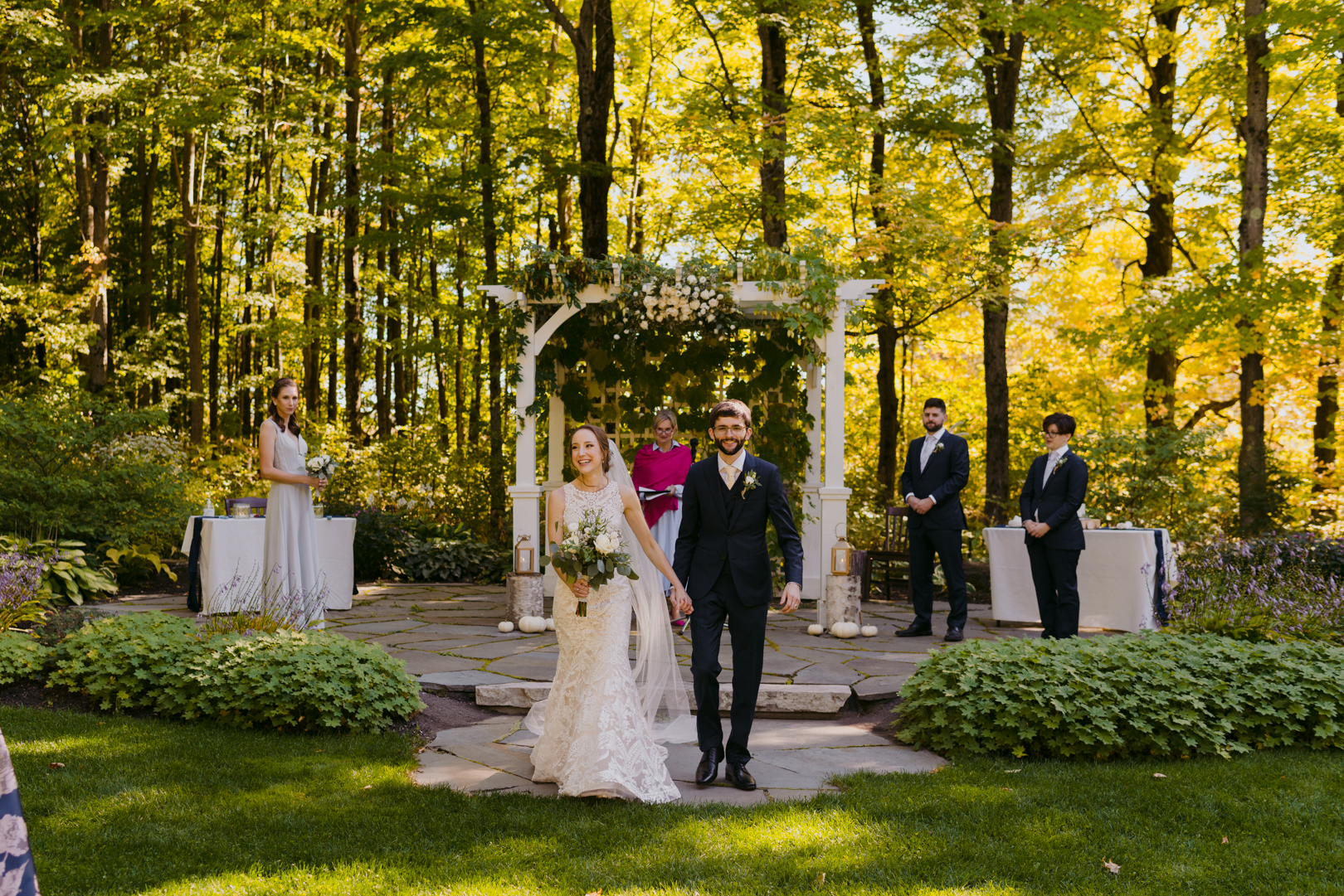 bride and groom recessional after wedding ceremony