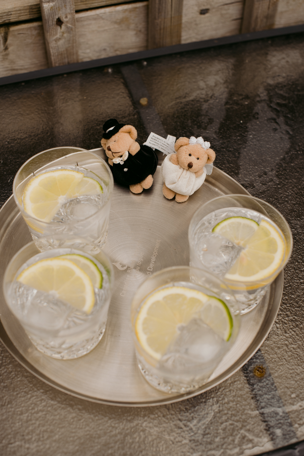 gin and tonic with husband and wife bears on a serving tray