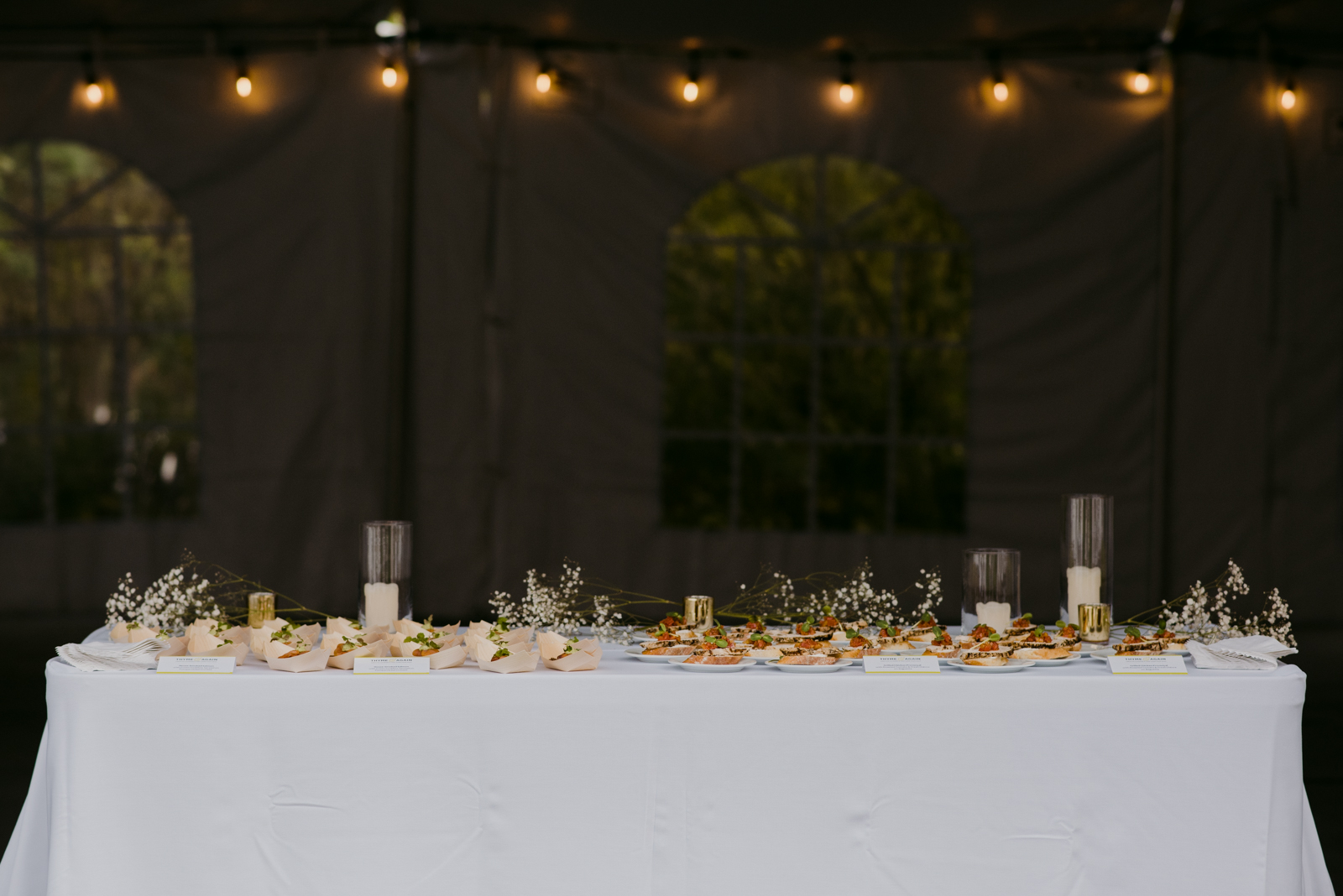 thyme and again appetizer table in a tent