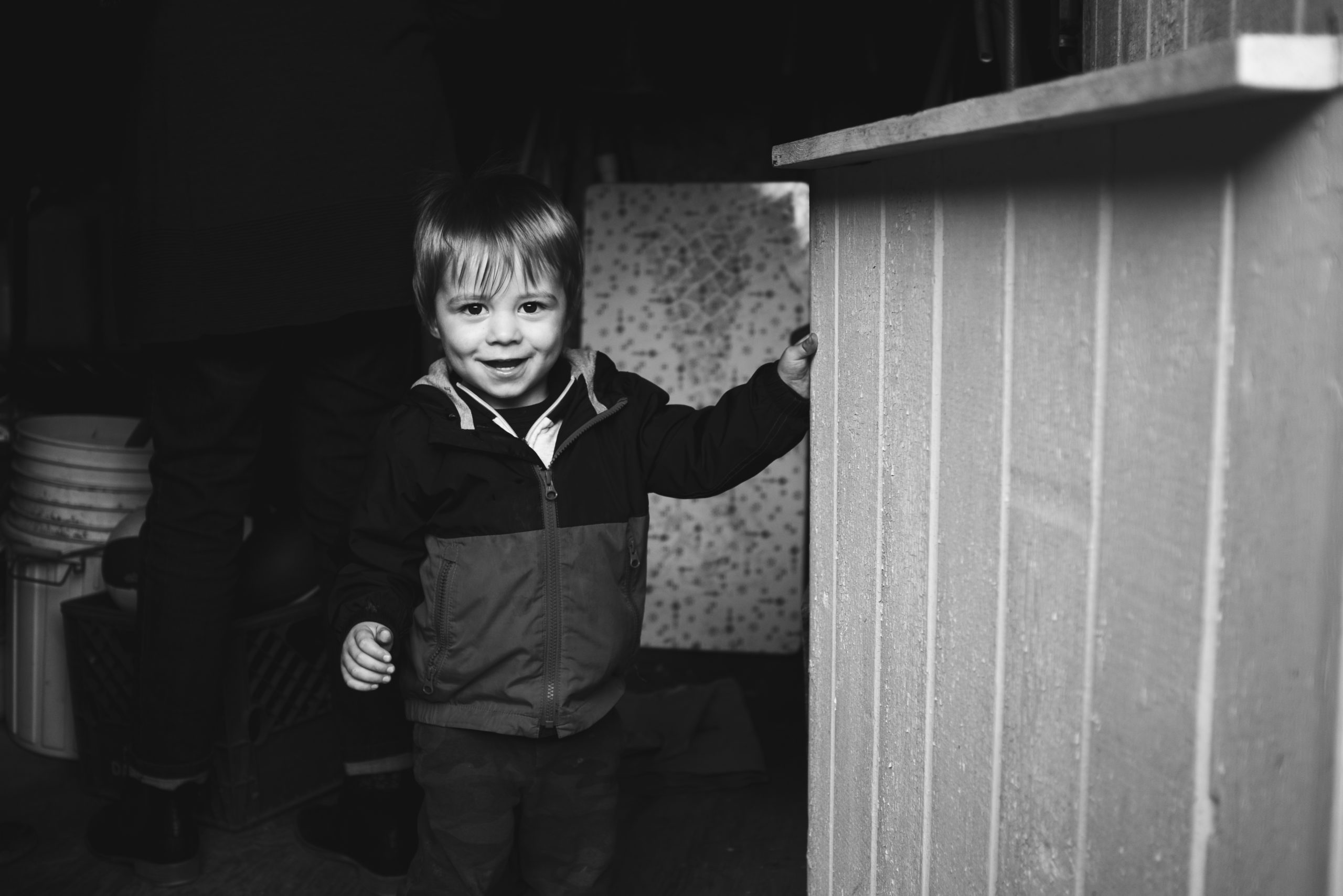 Toddler hiding in shed